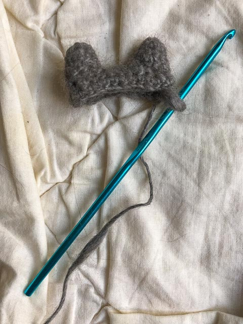 Crocheted cat ears, with the crochet hook and additional string | Kitten KaZoedle